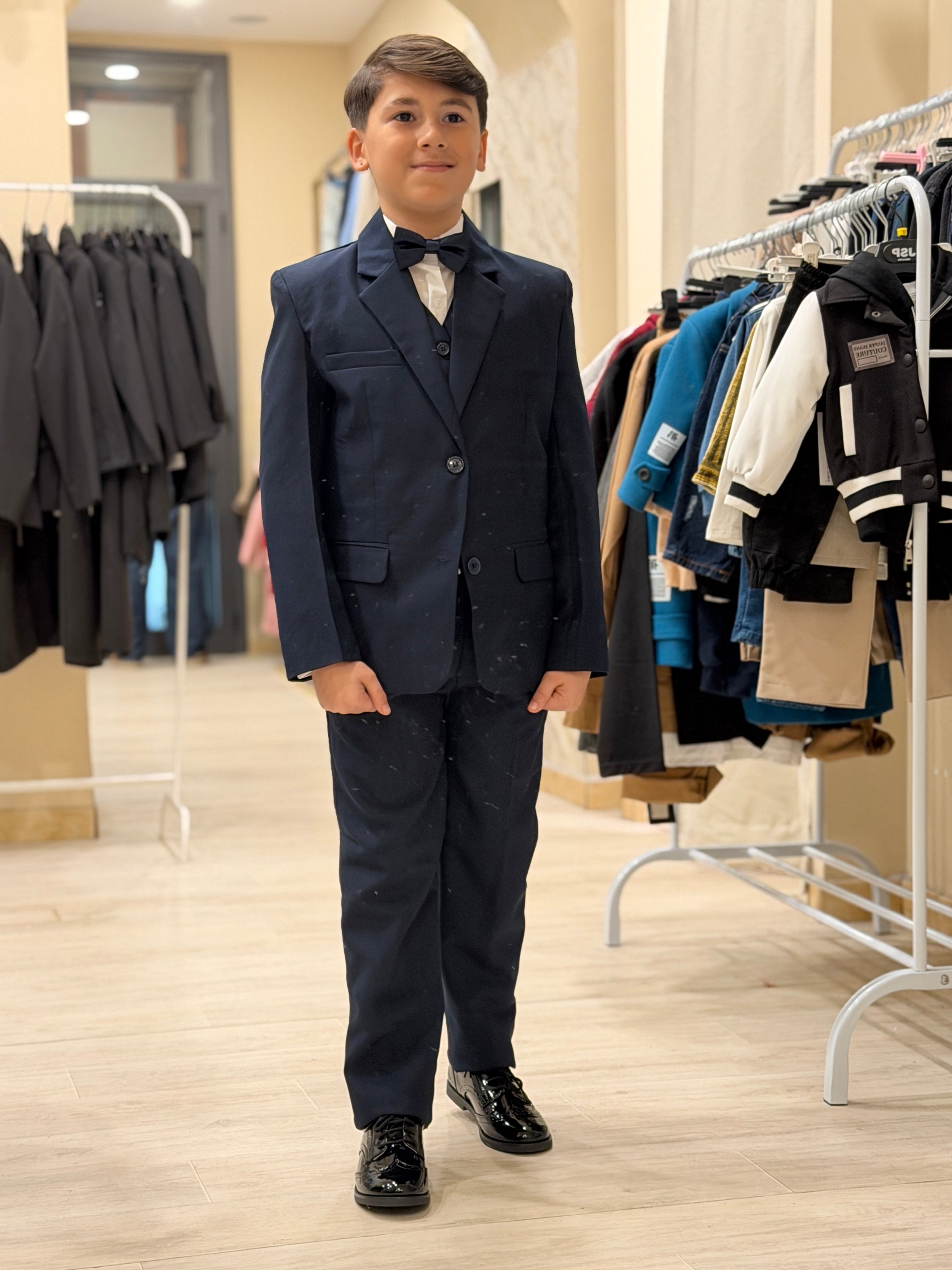 Abito monopetto con gilet blu navy