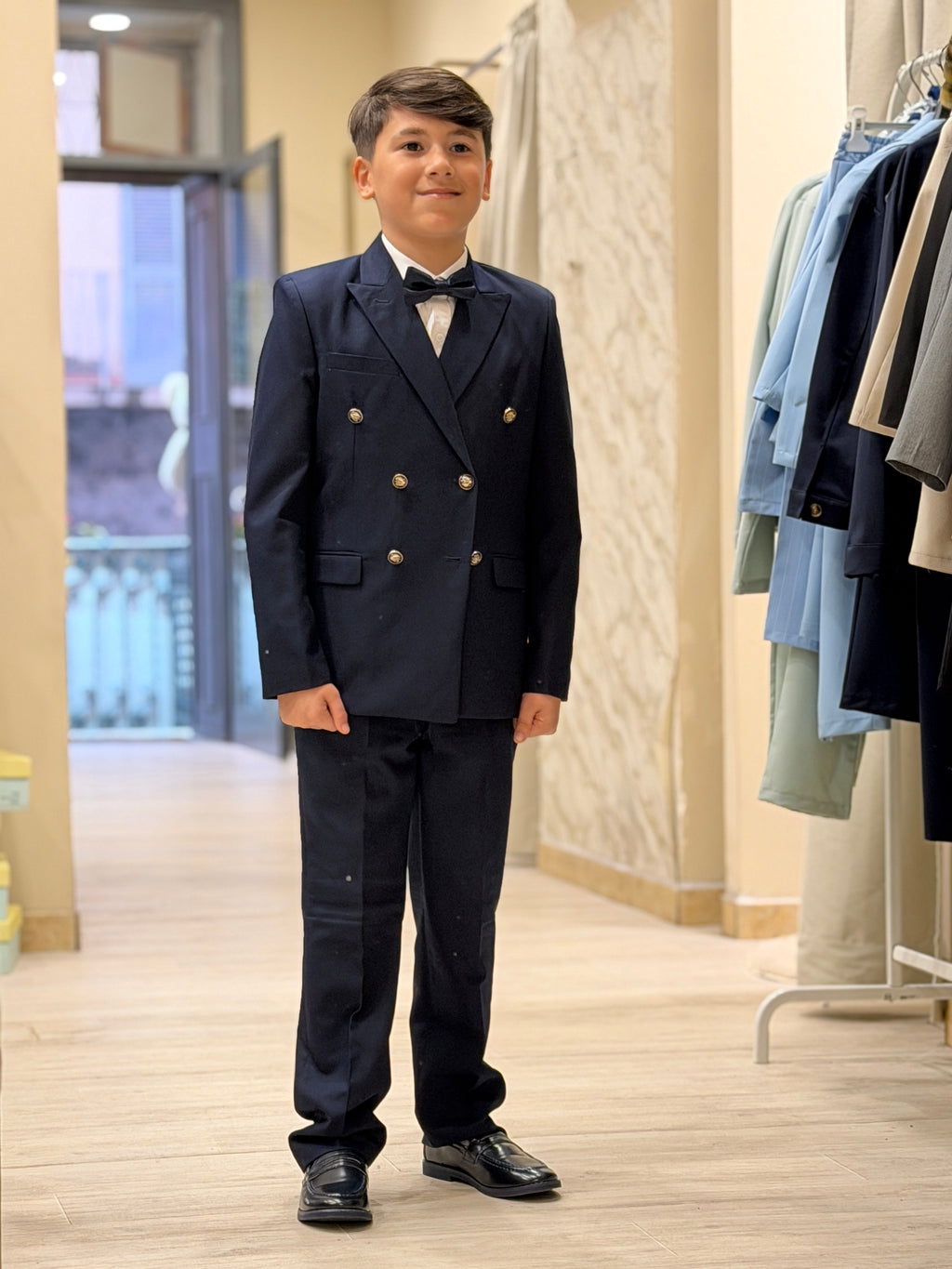 abito doppio petto con gilet blu navi