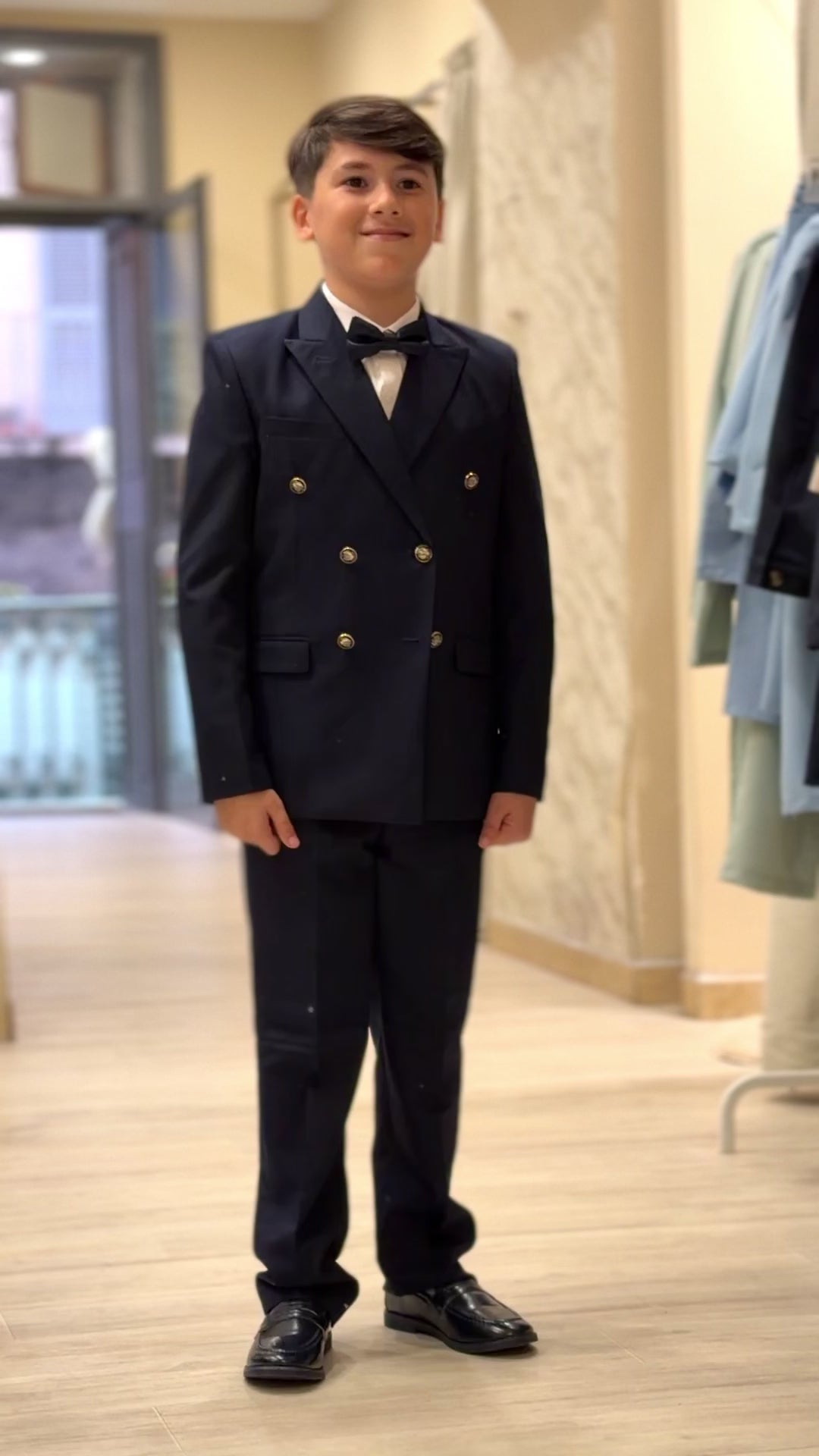 abito doppio petto con gilet blu navi